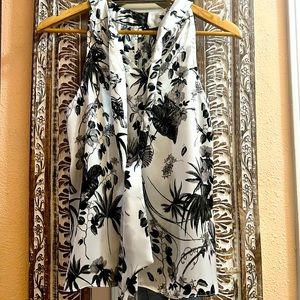 INC SLEEVELESS BLACK FLORAL DESIGN ON WHITE M SIZE BLOUSE. USED GOOD CONDITION